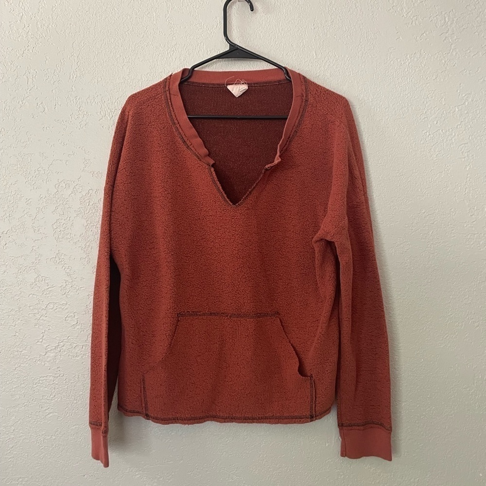Urban outfitters out from under orange sweatshirt